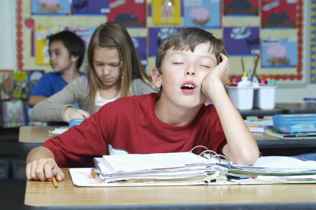 wellness ortho child sleeping in class